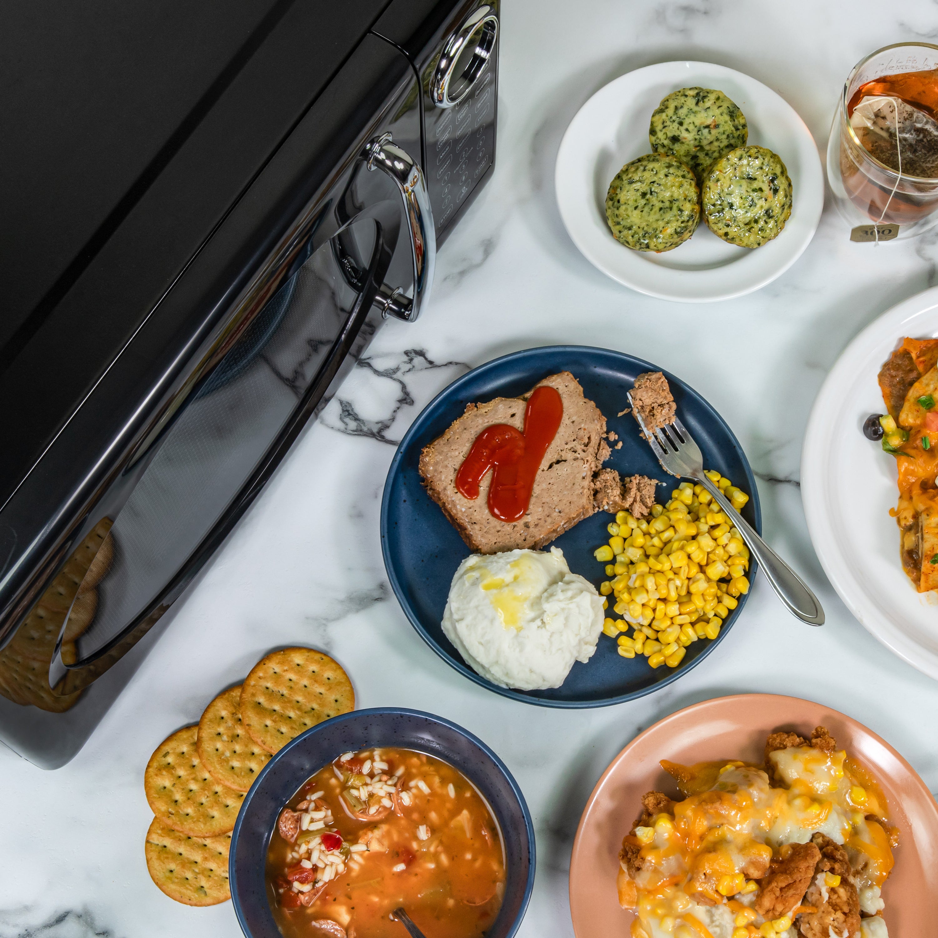 Nostalgia Retro Microwave Oven - 0.7 Cu Ft & 700-Watt Countertop Microwave with Glass Turntable, Child Safety Lock, 8 Auto-Cook Programs & Digital Clock - Black