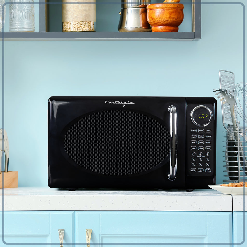 Nostalgia Retro Microwave Oven - 0.7 Cu Ft & 700-Watt Countertop Microwave with Glass Turntable, Child Safety Lock, 8 Auto-Cook Programs & Digital Clock - Black