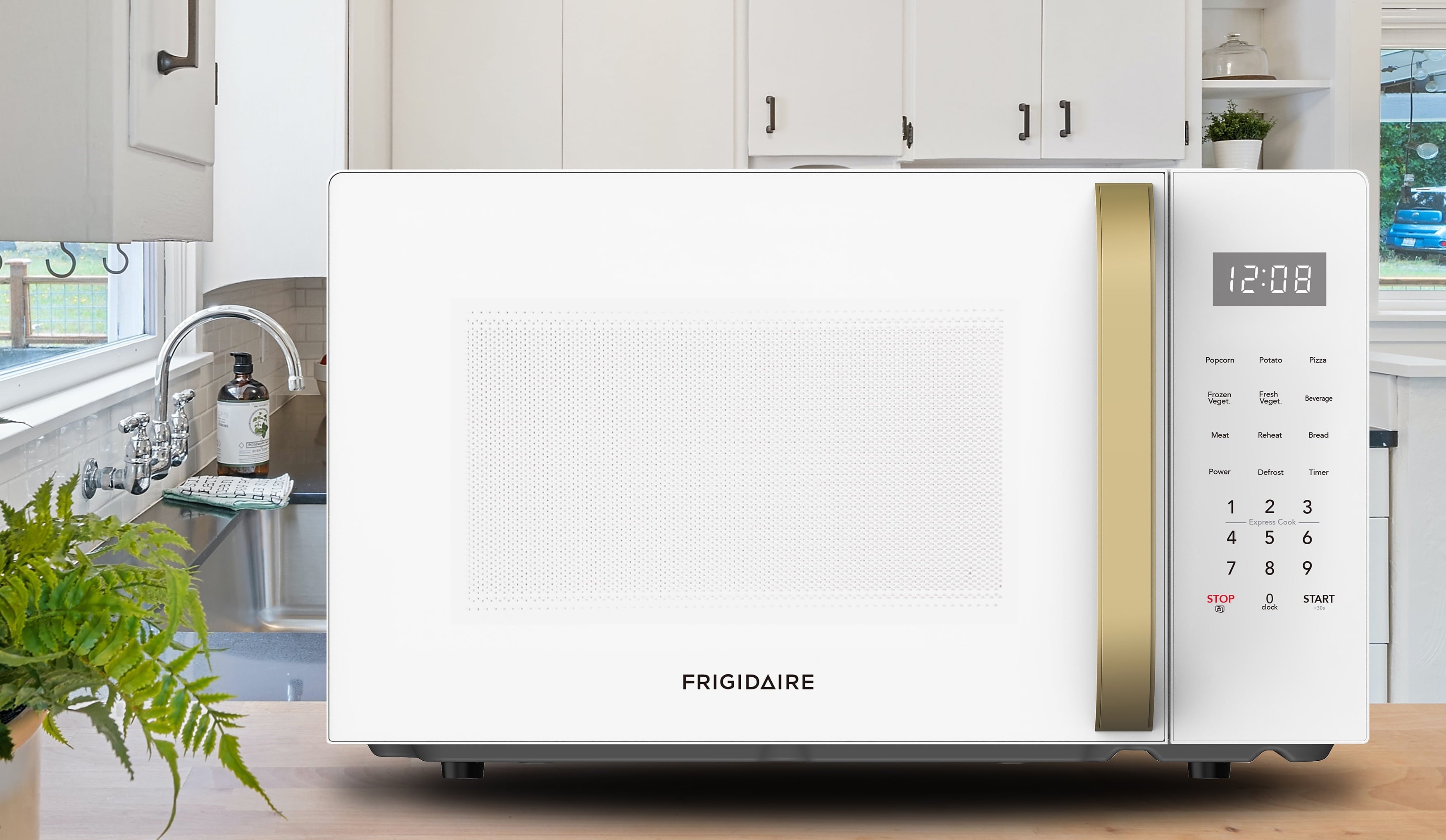 Frigidaire 1.1 CU. FT. Microwave, White and Gold